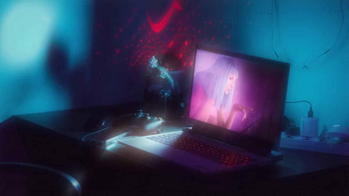 a laptop computer sitting on top of a desk
