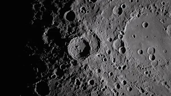 Close-up view of the moon's cratered surface