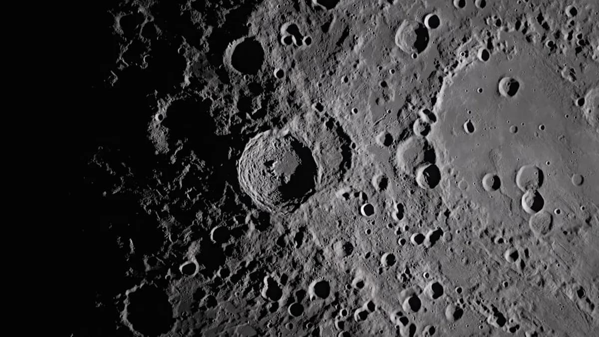 Close-up view of the moon's cratered surface
