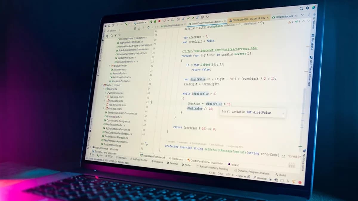 Laptop screen displaying lines of code