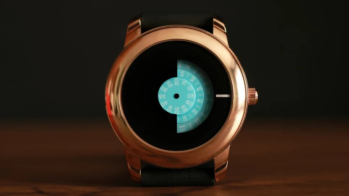 silver and black round analog watch