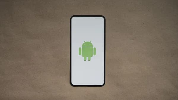 a cell phone with a green icon on it