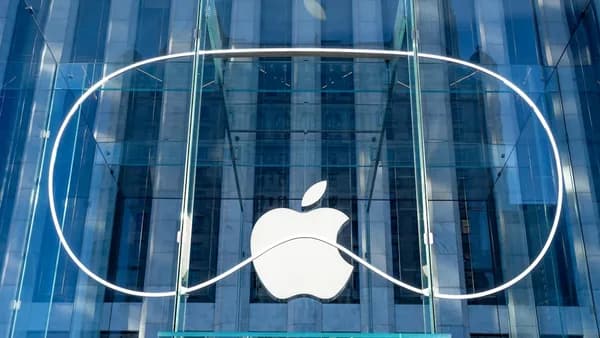 an apple logo on the side of a building