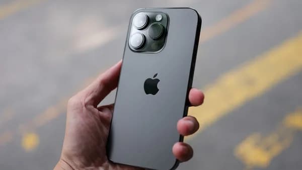 a person holding an iphone in their hand