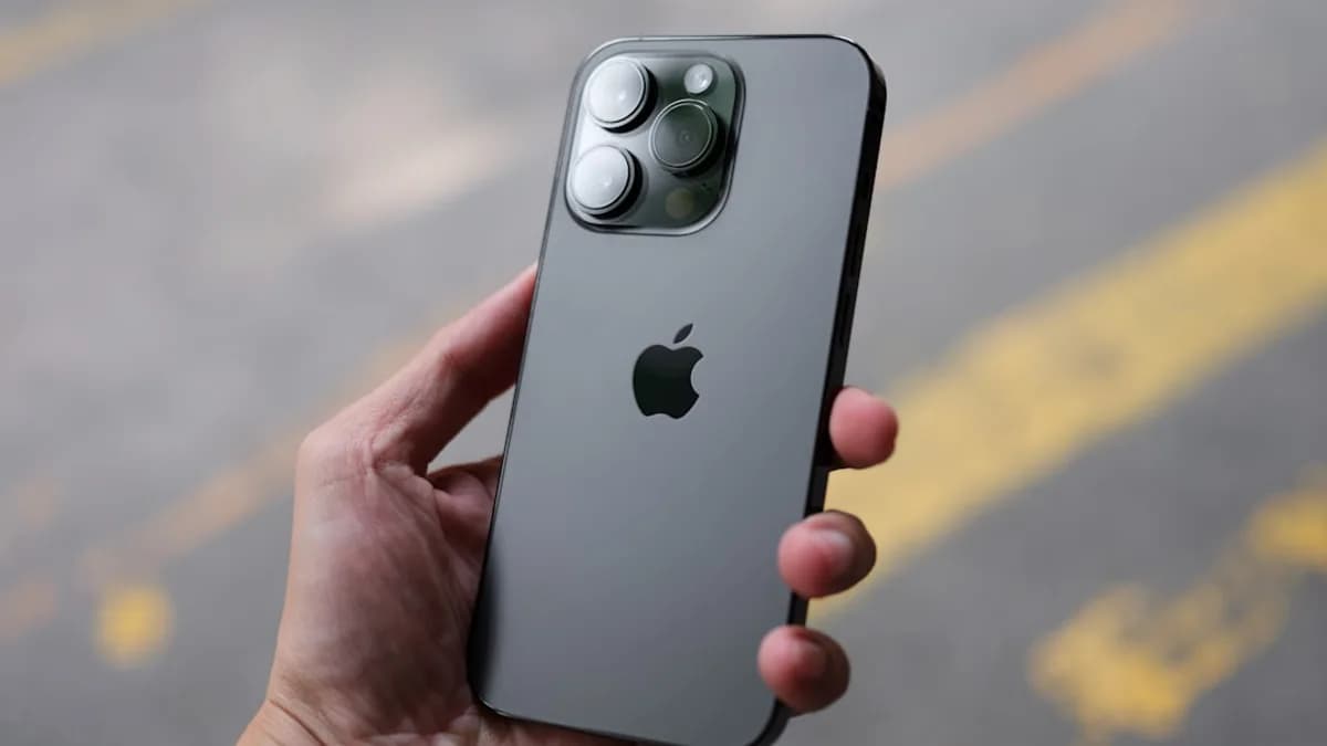 a person holding an iphone in their hand