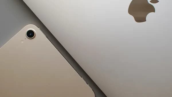 a close up of an apple laptop computer