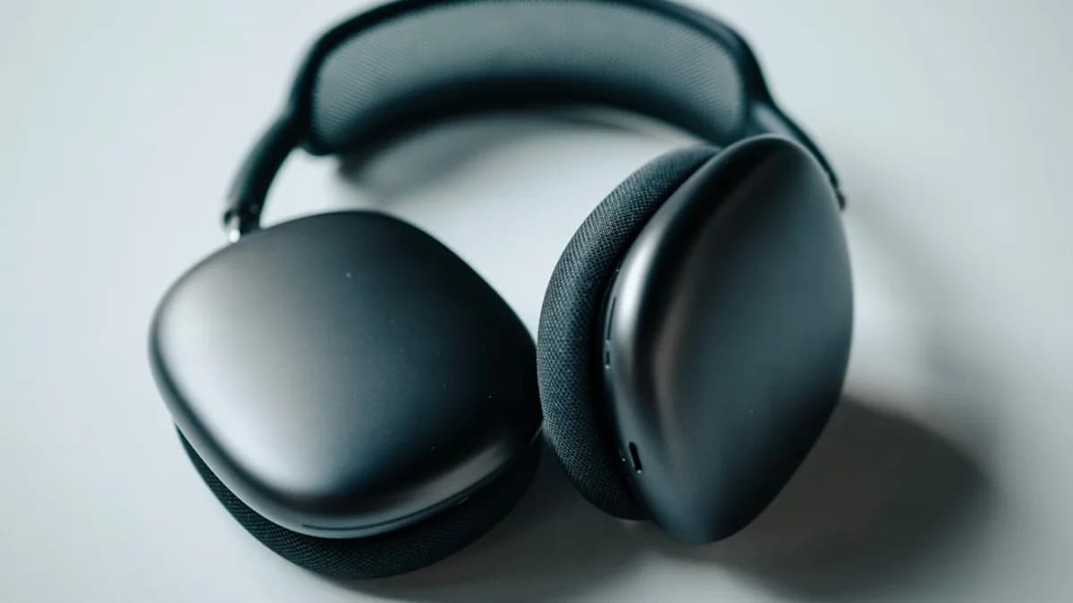 black headphones on white table