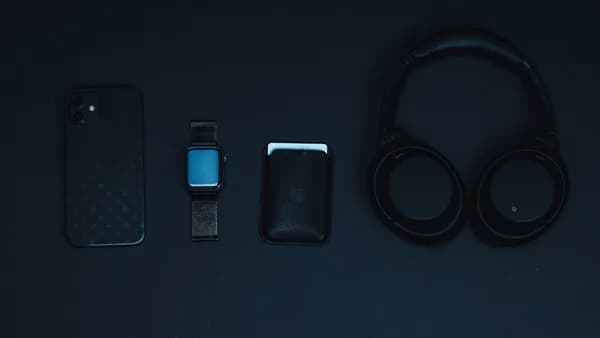 black and blue iphone case on black surface