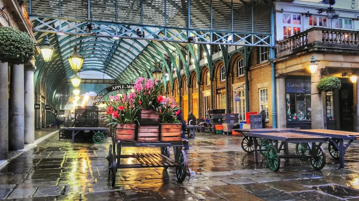 Wet market stalls with flowers and carts