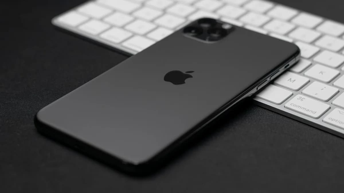 silver ipad on black table