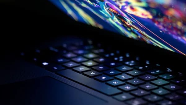 a close up of a laptop computer keyboard