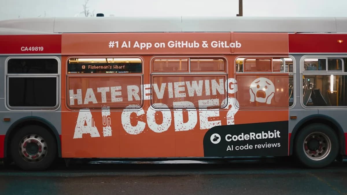 Bus advertisement for coderabbit ai code reviews.