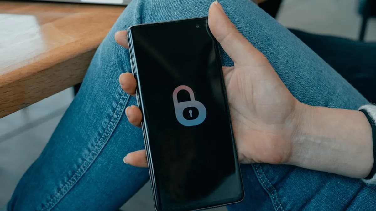 black and white smartphone on persons hand