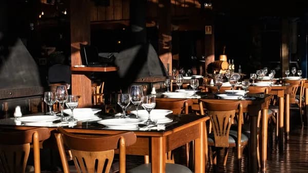 brown wooden table with chairs