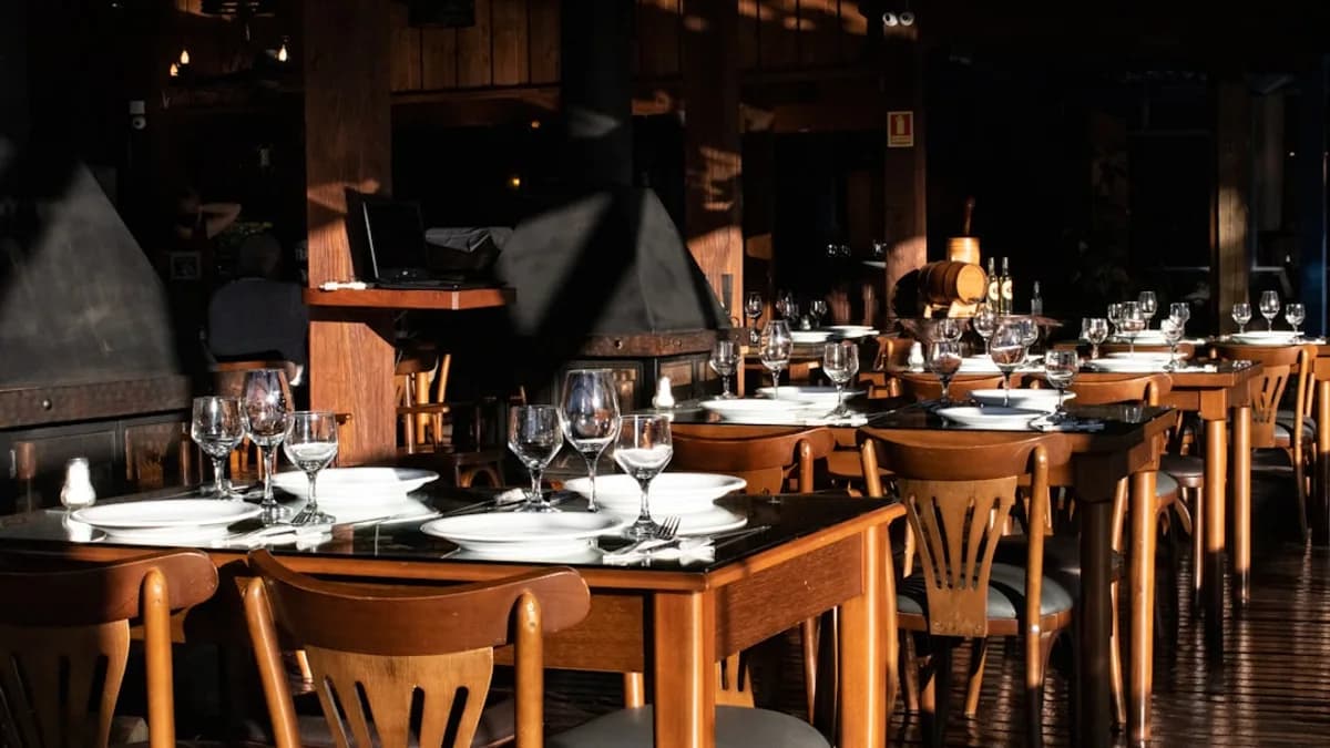 brown wooden table with chairs