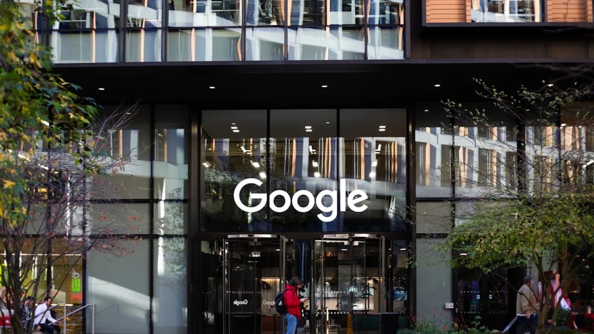a man standing in front of a google building