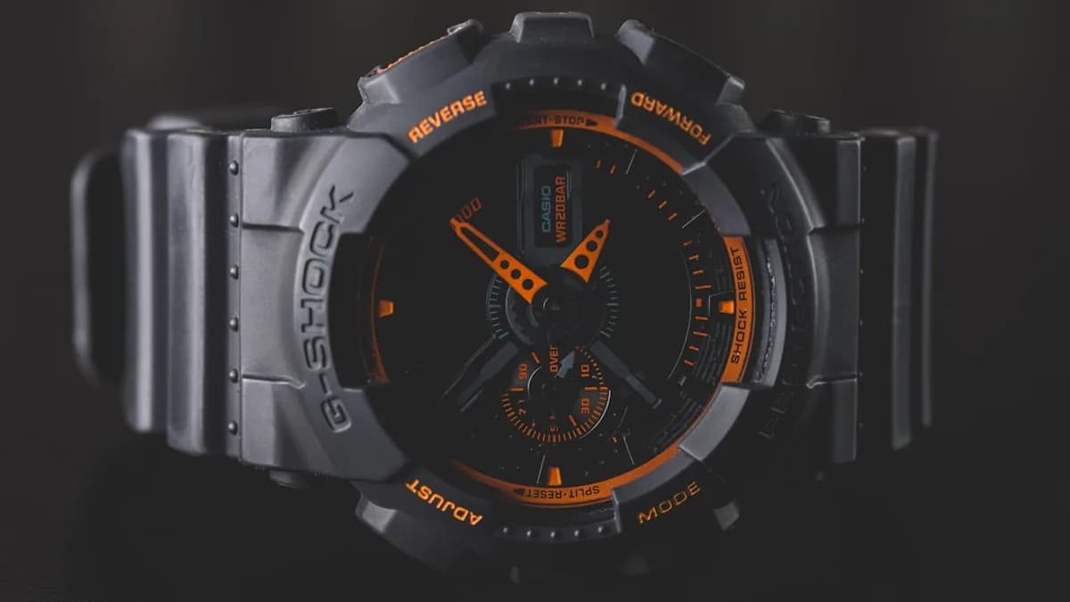 round black and orange Casio G-Shock analog watch