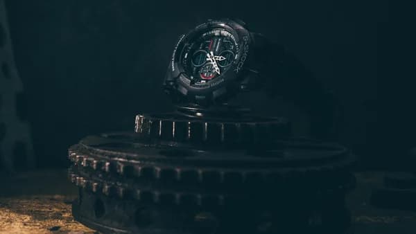 black and silver round watch