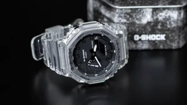 a close up of a watch on a table