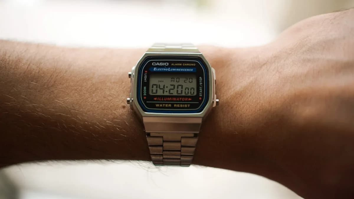 a close up of a person's wrist with a watch on it