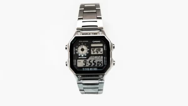 black and silver-colored Casio digital watch with link bracelet