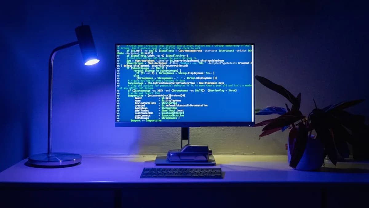 Code appears on a computer screen.