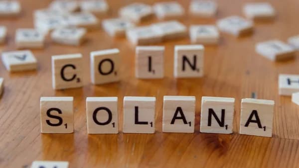 Scrabbled scrabble tiles spelling the word colina, on a
