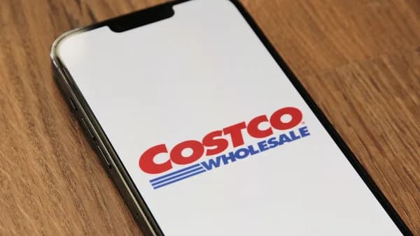 a close up of a cell phone on a table