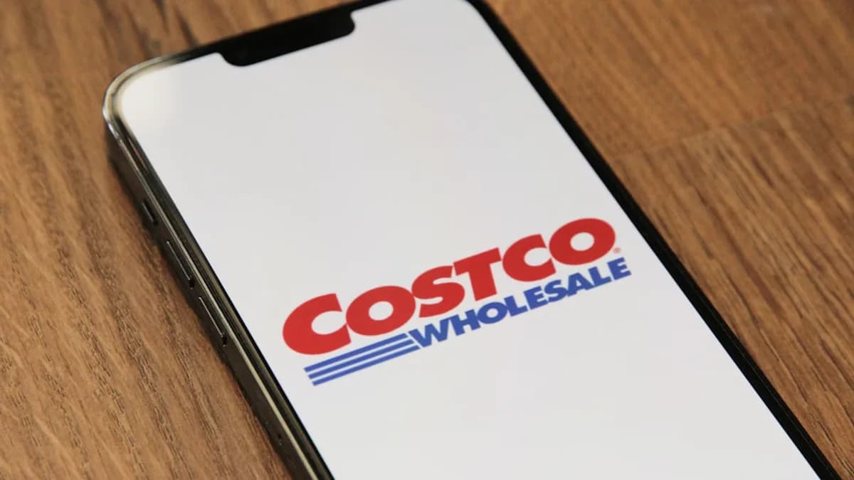 a close up of a cell phone on a table