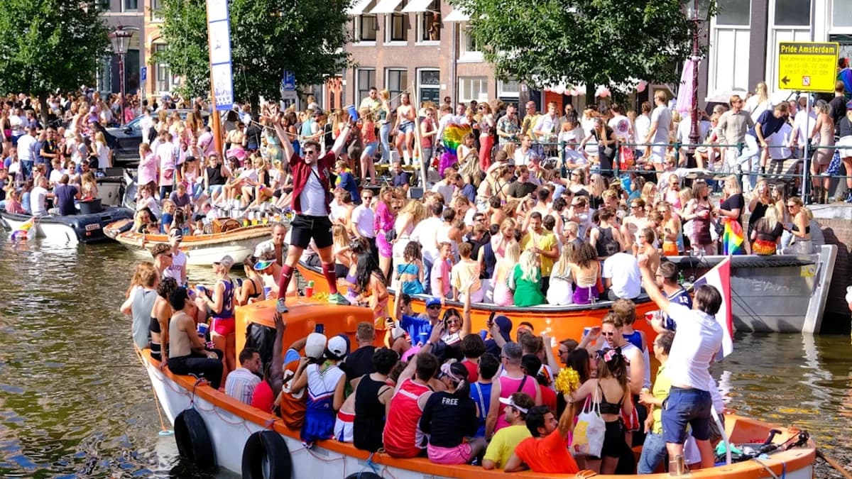 a large crowd of people on a boat