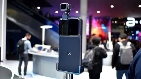 A dark blue device with a camera on top