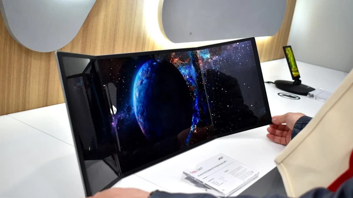Curved screen displaying a blue planet in space.