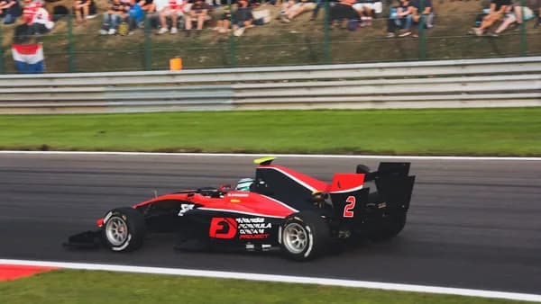 red and black go kart on track
