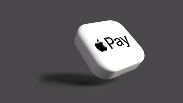 a white dice with the word pay on it