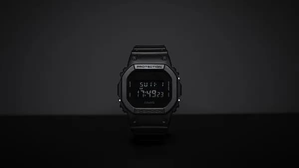 black casio digital watch at 11 00