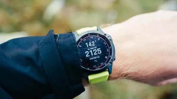A close up of a person wearing a wrist watch