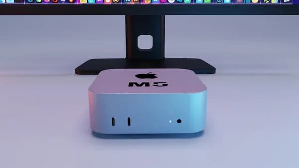 Apple mac mini computer with monitor behind monitor