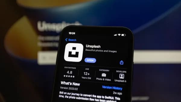 a close up of a cell phone with a webpage on the screen