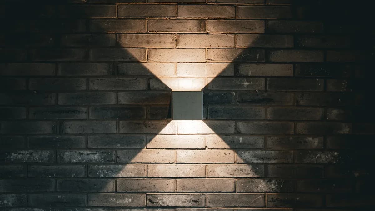 Square light fixture on a brick wall