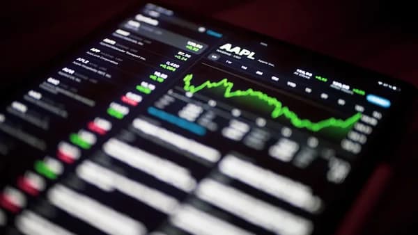 a close up of a cell phone with a stock chart on it