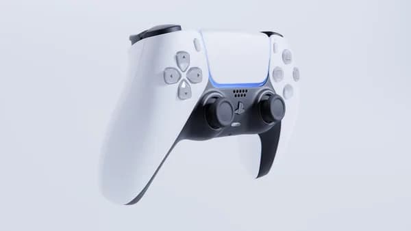 a video game controller flying through the air