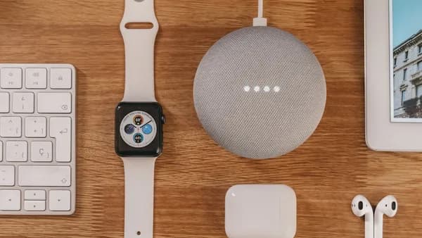 silver aluminum case apple watch with white sport band