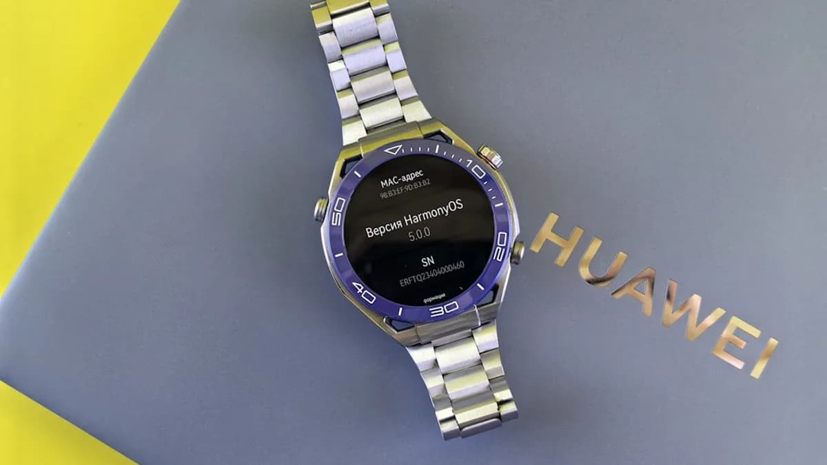 A huawei watch rests on its brand box.