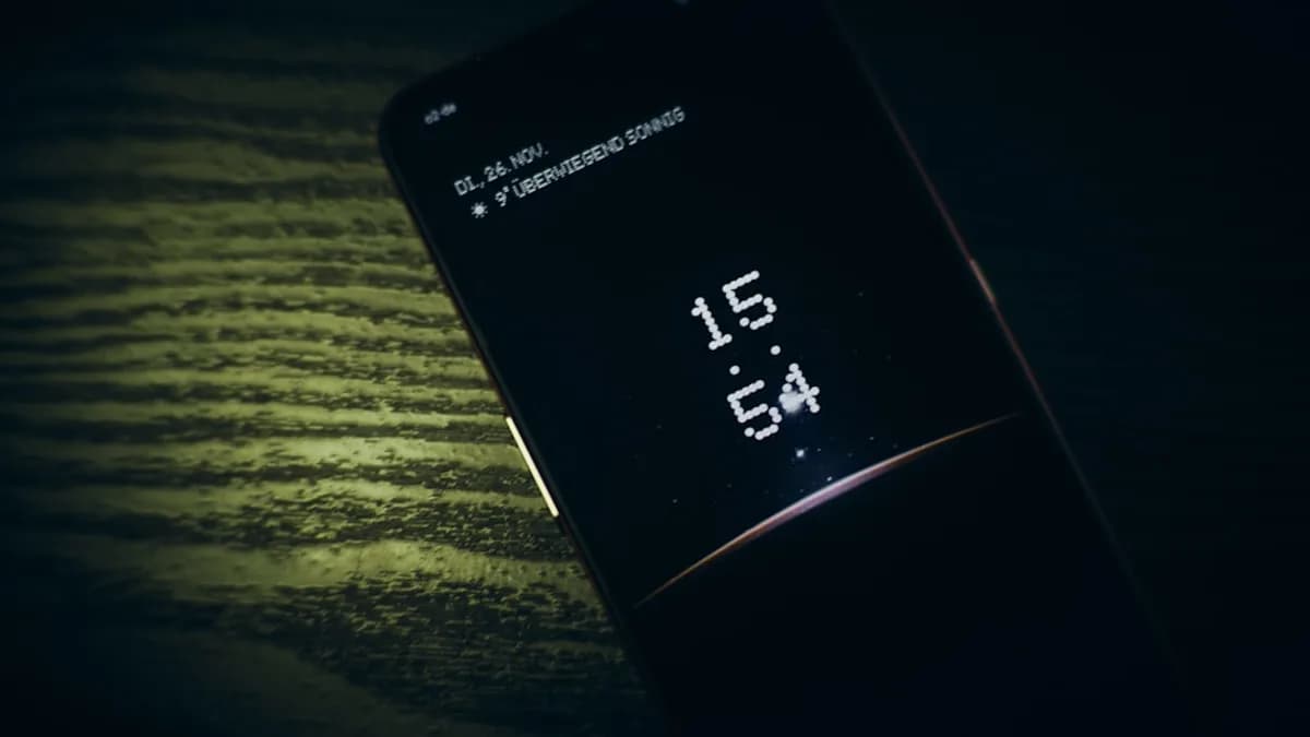 A cell phone sitting on top of a table