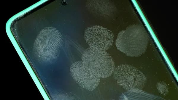 Smudged smartphone screen with fingerprints