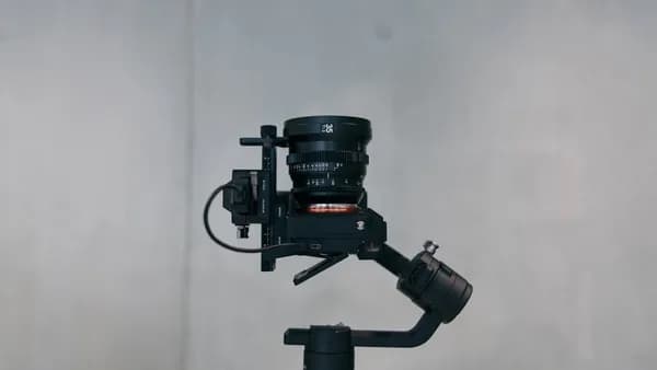 black camera stablizer with camera close-up photography