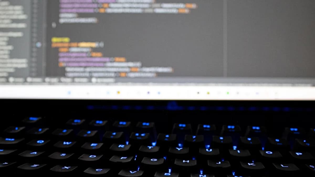 a computer keyboard with a monitor