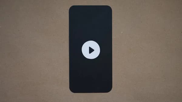 a black device with a play button on it