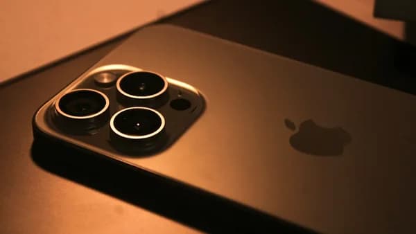 a close up of a cell phone on a table