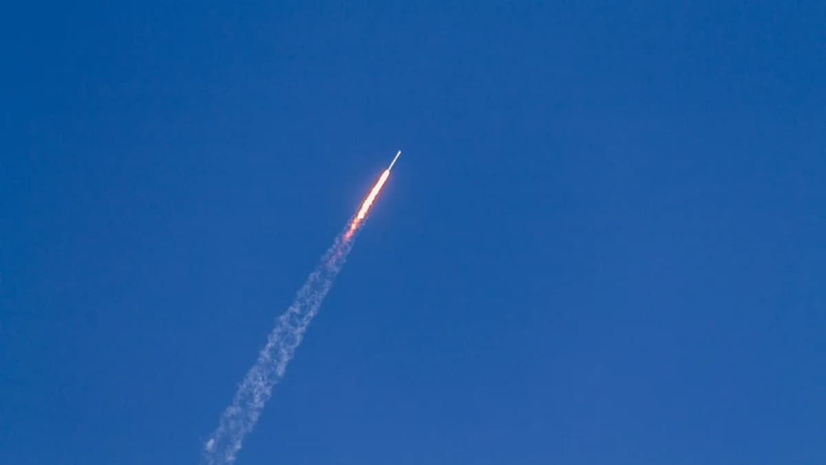 flying rocket during daytime